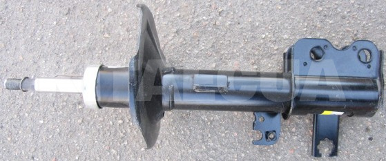 Амортизатор передній правий газомасляний на GEELY EMGRAND EC7 (1064001257)