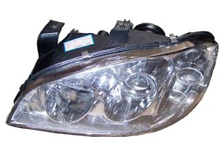 Фара передняя левая линзованная 