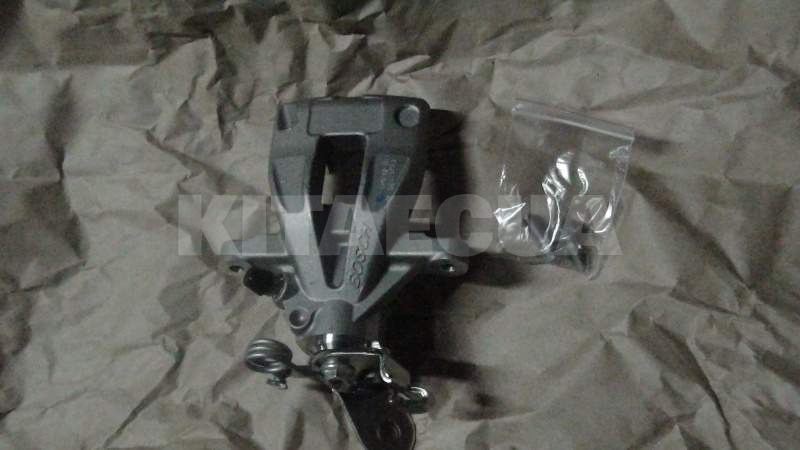 Супорт гальмівний задній правий ОРИГИНАЛ на Geely EMGRAND EC7 (1064001723)